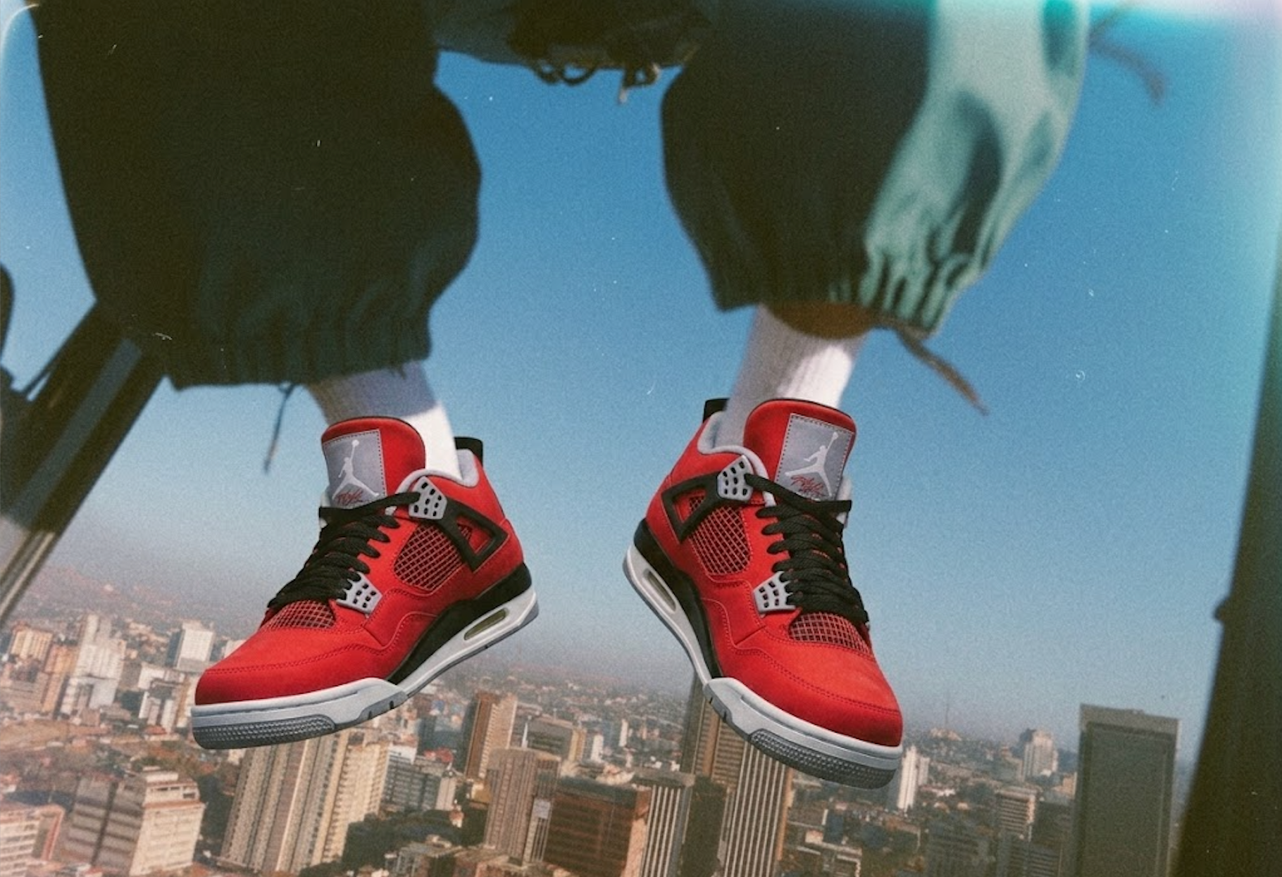 Air Jordan 4 Retro 'Toro Bravo' - Fire Red/White/Black/Cement Grey